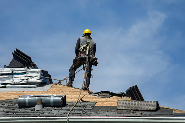 Professional Gutter Installation technician working in Alpine, NJ
